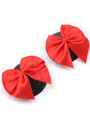 Paire de cache tétons adhésifs noir avec nœud papillon rouge